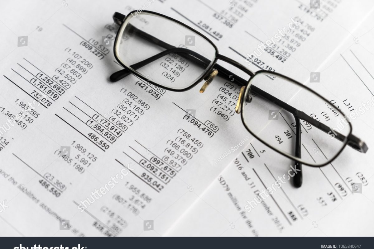 stock-photo-business-composition-financial-analysis-income-statement-business-plan-with-glass-1065840647