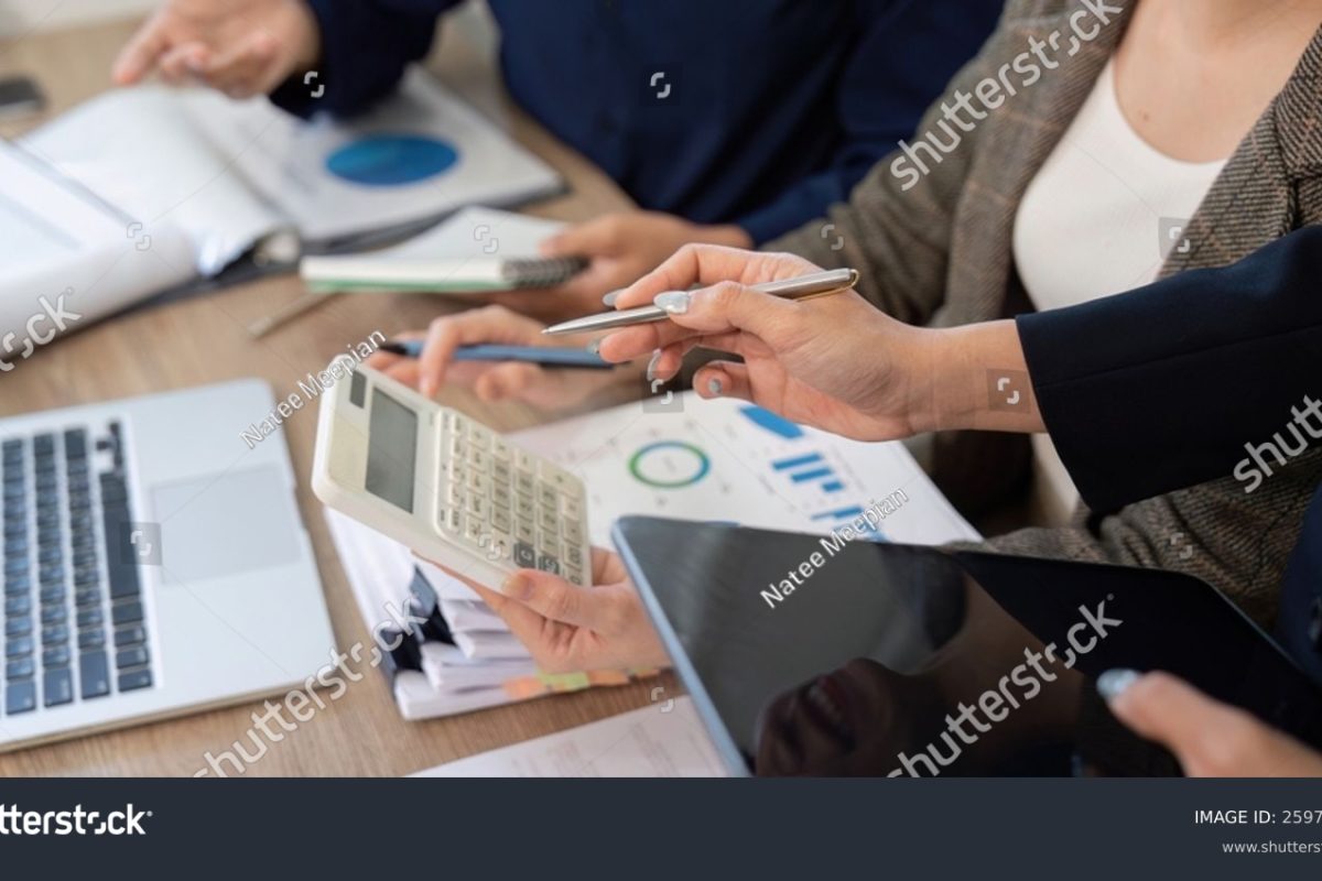stock-photo-data-analysis-and-financial-reports-team-reviewing-documents-to-strategize-tax-solutions-and-2597960241
